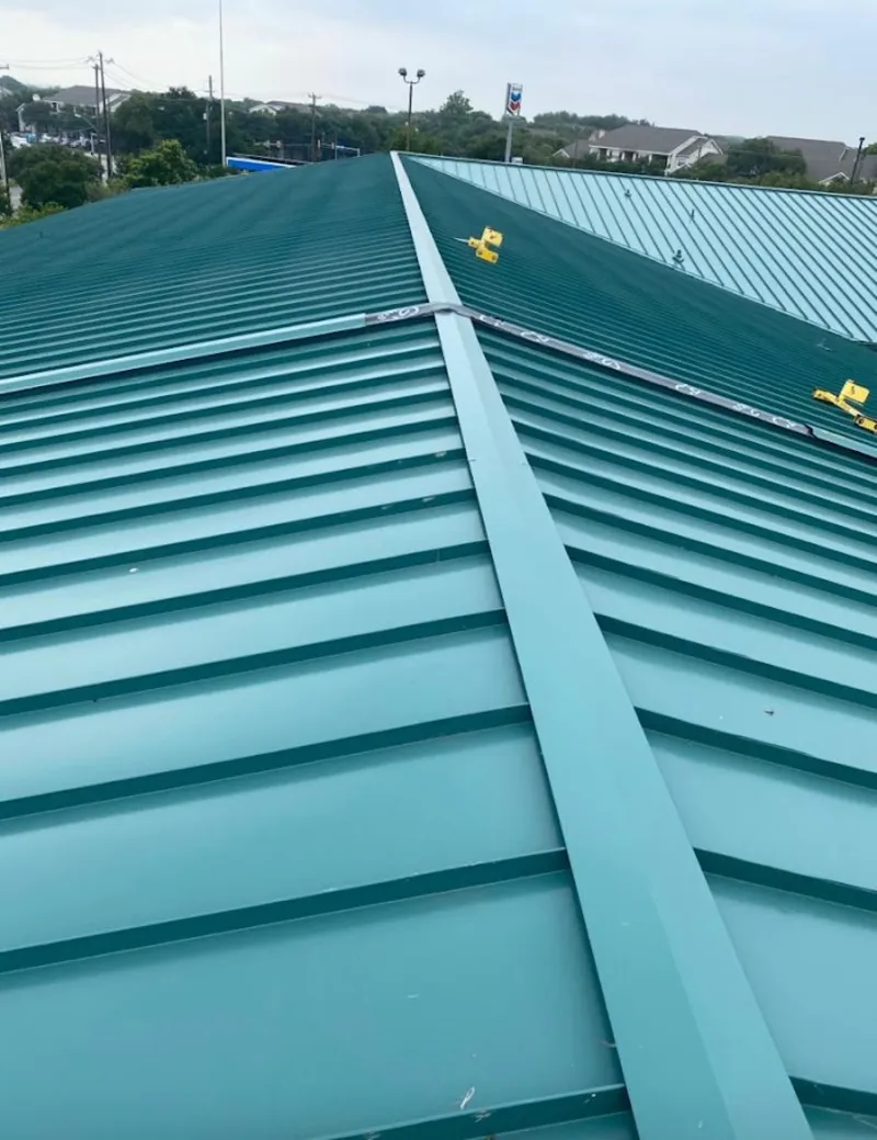 Green commercial metal roof ridge and valley for Metal Roof Repair in Cherokee