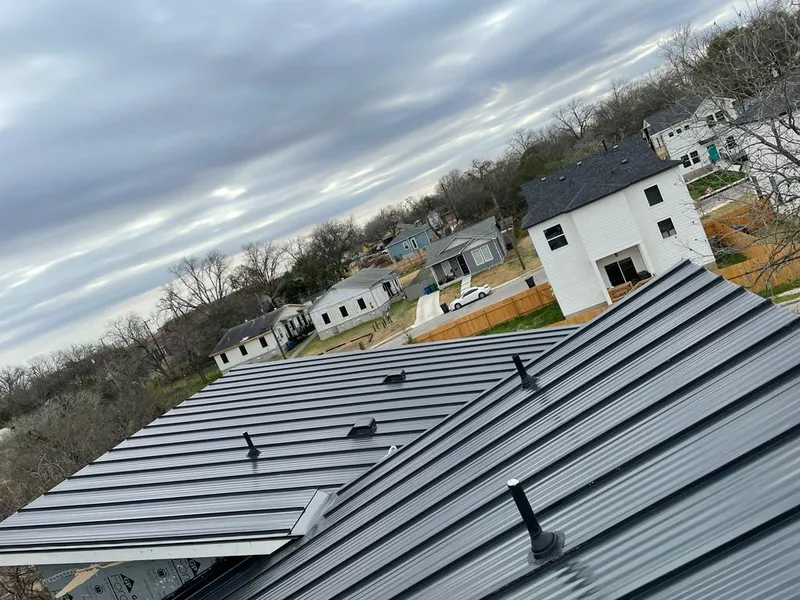 Standing seam metal roof panels with vents for Skylight Repair in Cherokee